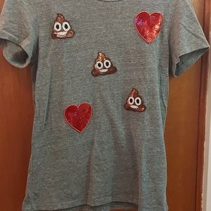 Adorable t shirt with sequin emojis.